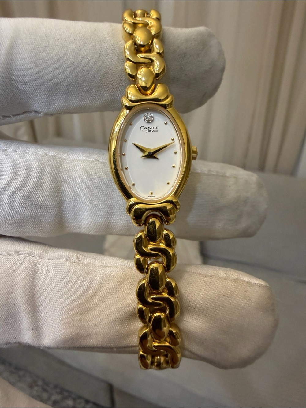 Caravelle by Bulova 48K70 Women's Gold Tone Oval Diamond Accent Dress Watch